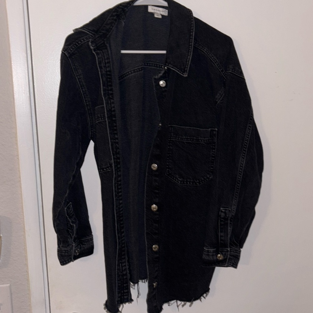 Long black top shop jacket with fringe on bottom